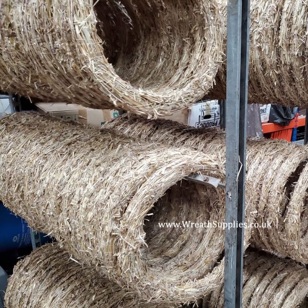 Racks of straw wreath bases